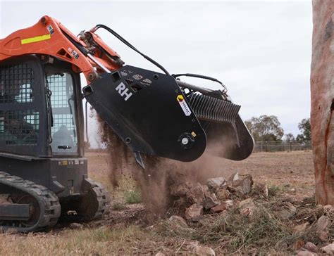 skid steer rotary rock picker|pick up skid mounted equipment.